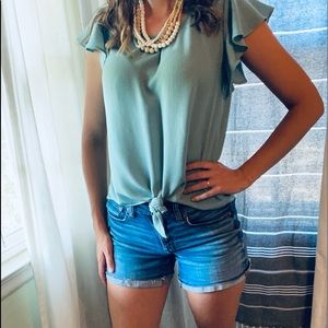 Adorable flutter sleeve summer top.
